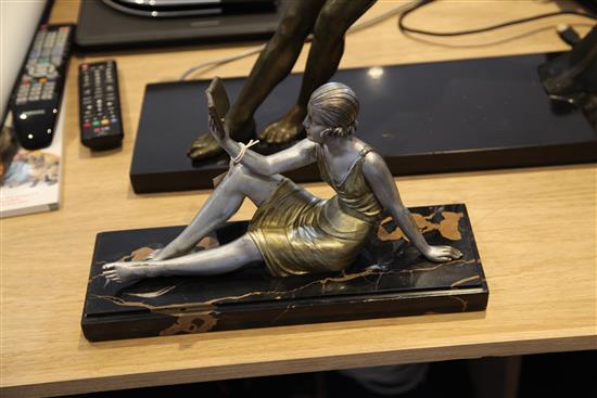 Chiparus. A painted bronze figure of a lady, The Reader, H. 8.5in.